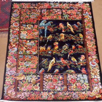 Beautiful carpet with embroidery flowers and birds